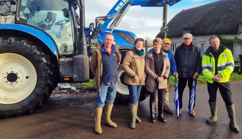 MP Sarah Dyke, Flooding Minister Emma Hardy and Somerset residents in Muchelney