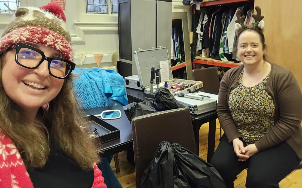 Taunton Specsavers manager Nicole Hawkins and clinical lead optometrist Amy Sampson putting together the winter care packages