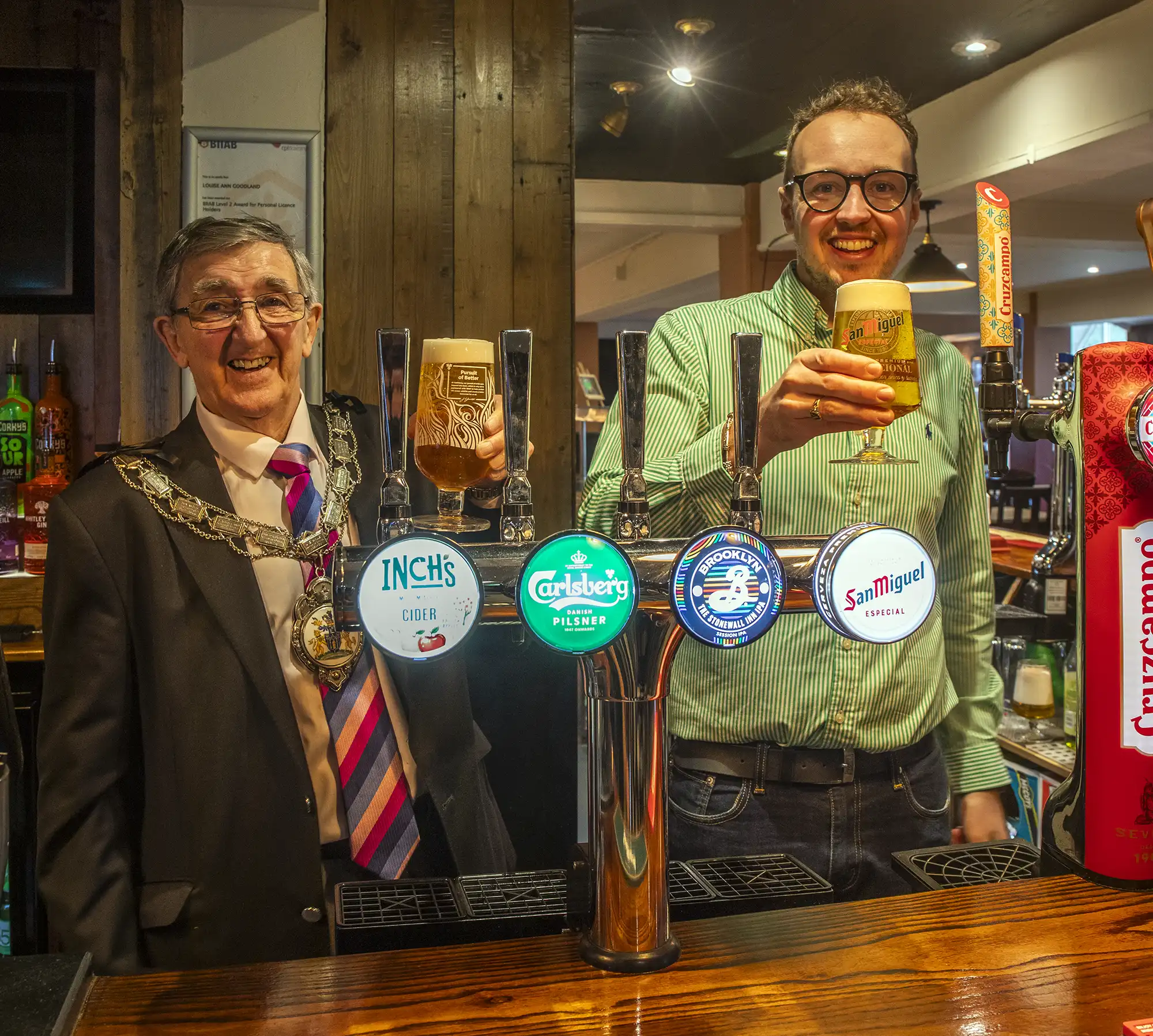 Yeovil Mayor Tony Lock and MP Adam Dance toast the new-look Arrow pub