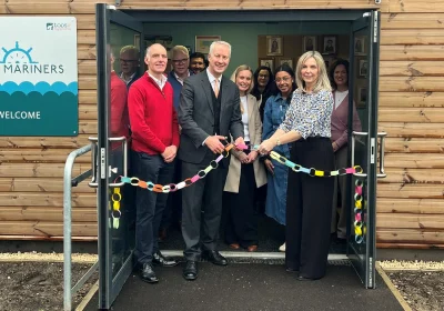 Taunton MP Gideon Amos does the honours at the expanded UKHO nursery, alongside chief executive Vanessa Blake