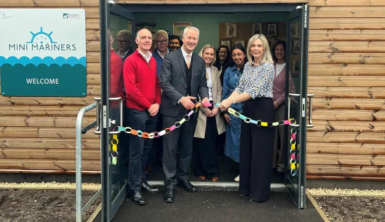 Taunton MP Gideon Amos does the honours at the expanded UKHO nursery, alongside chief executive Vanessa Blake