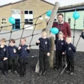 Executive headteacher at Christ Church First School in Frome with pupils