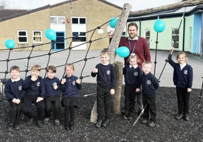 Executive headteacher at Christ Church First School in Frome with pupils