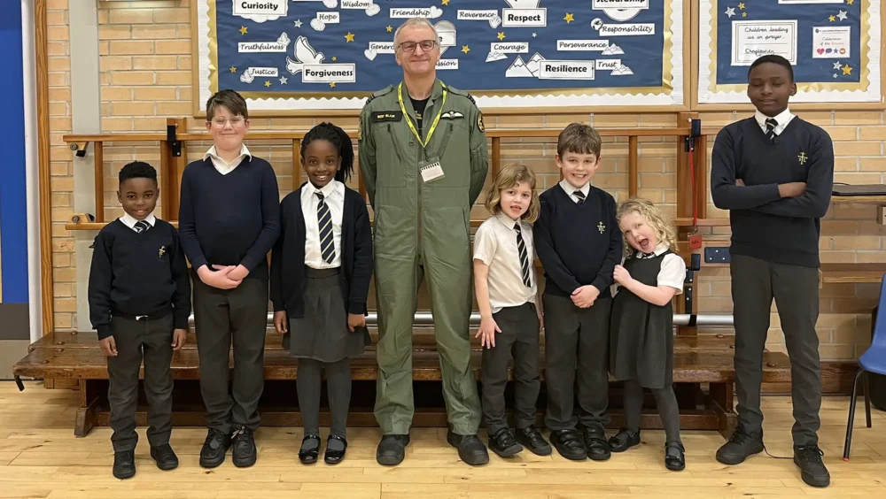 Pilot Bertie Blair with pupils at St Louis in Frome