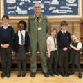 Pilot Bertie Blair with pupils at St Louis in Frome
