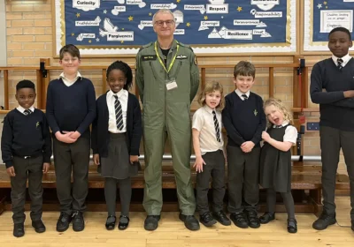 Pilot Bertie Blair with pupils at St Louis in Frome
