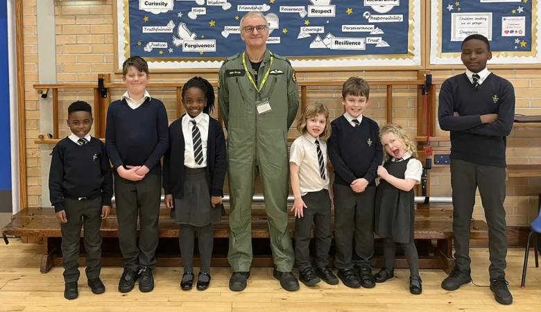 Pilot Bertie Blair with pupils at St Louis in Frome